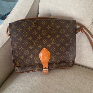 Vintage LOUIS VUITTON monogrammed Cartouchiere 26 crossbody bag.